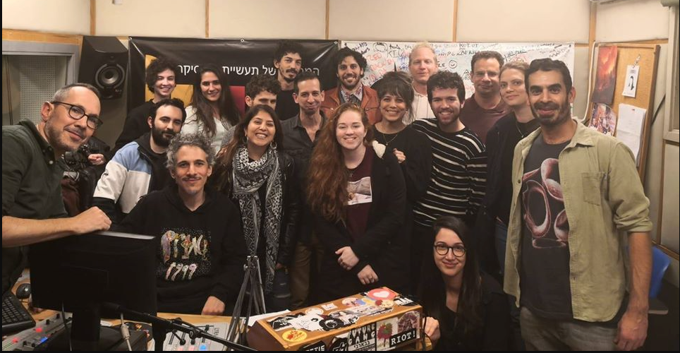 The Edge radio volunteer team gathered in the studio